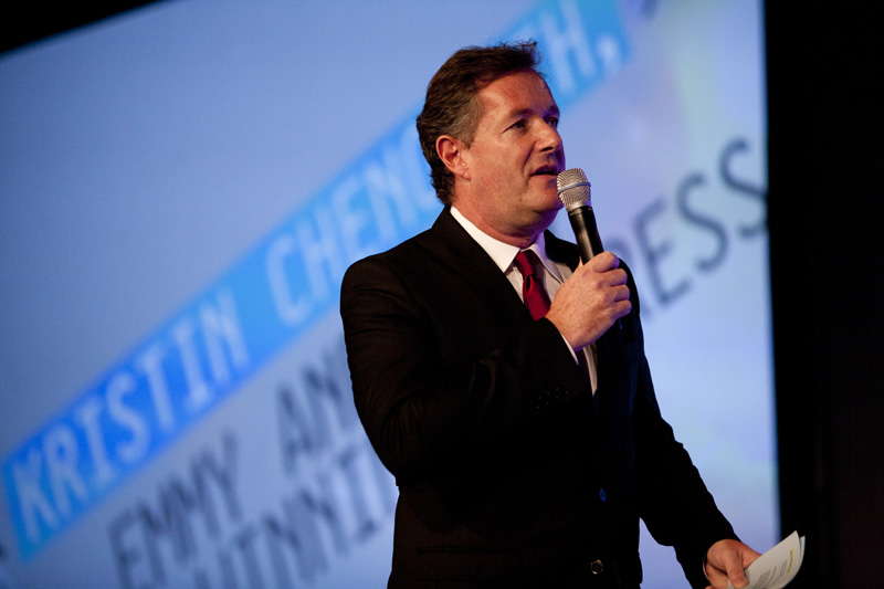 Piers Morgan speaking with a microphone