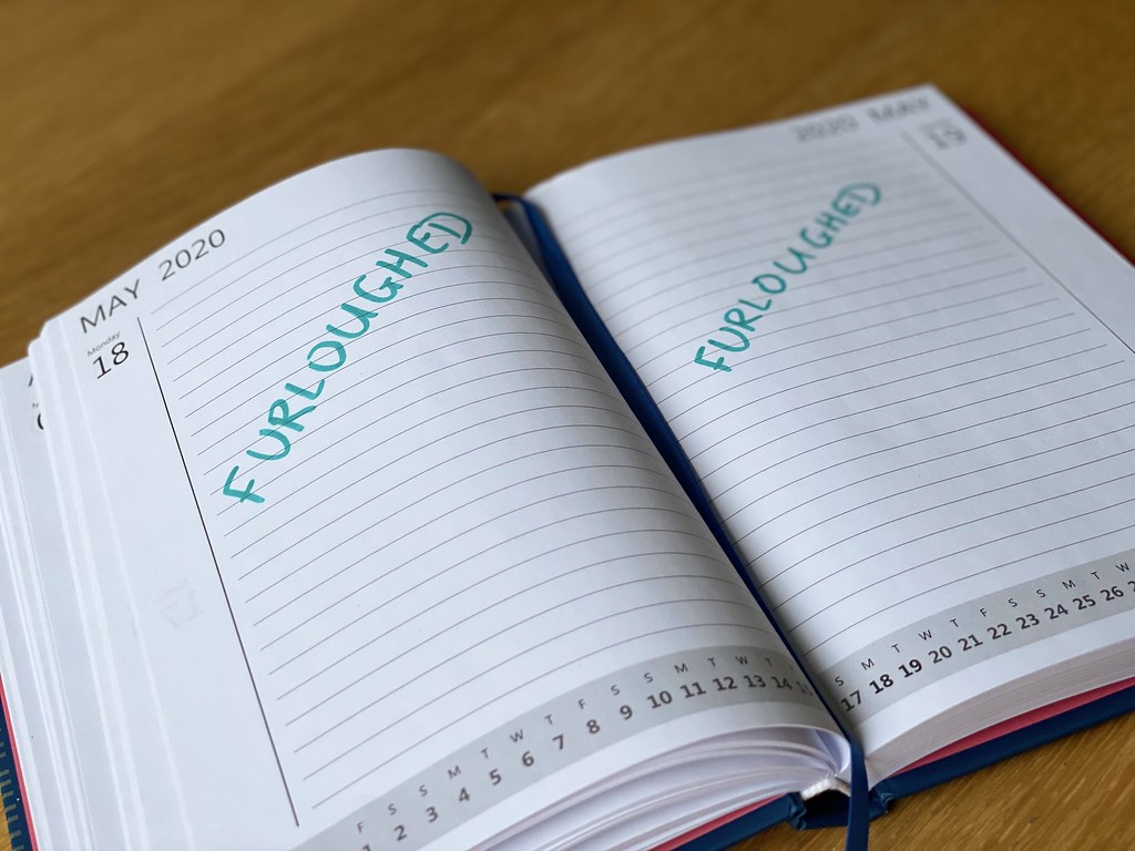 Furloughed written in a notebook