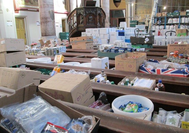 A photo of boxes of food in a food bank