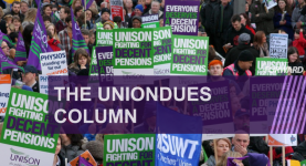 A photo of a trade union protest with the words "The UnionDues Column" overlaid