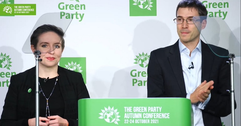 Carla Denyer and Adrian Ramsay speaking at Green Party Conference