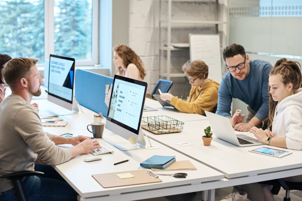 A photo of people working in an office
