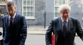 Boris Johnson with the Cabinet Secretary Simon Case, who has been charged with investigating the Number 10 Christmas Party