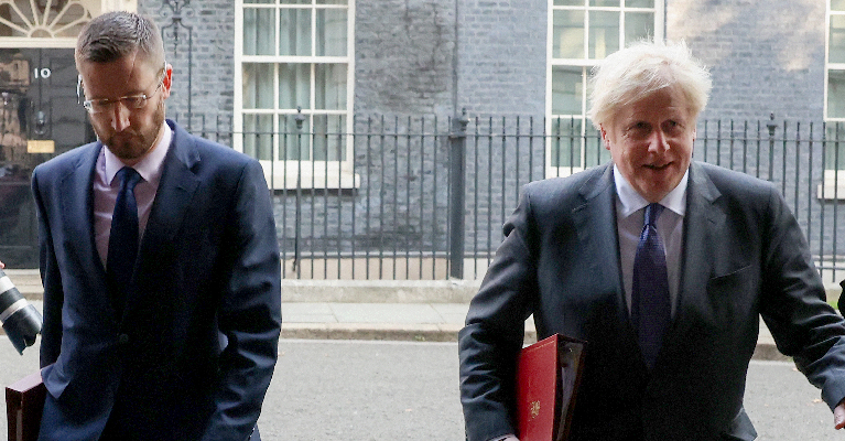 Boris Johnson with the Cabinet Secretary Simon Case, who has been charged with investigating the Number 10 Christmas Party