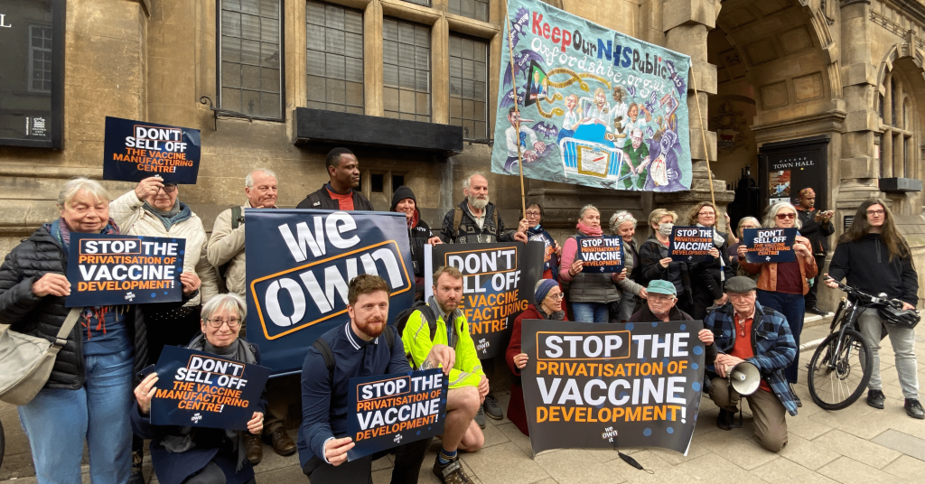 Protesters outside Oxford City Council campaigning against the sell off of the Vaccine Manufacturing and Innovation Centre (VMIC)