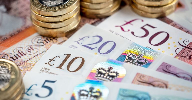 An image showing bank notes and pound coins
