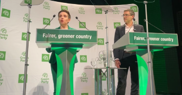 Carla Denyer and Adrian RAmsay speaking at Green Party Conference
