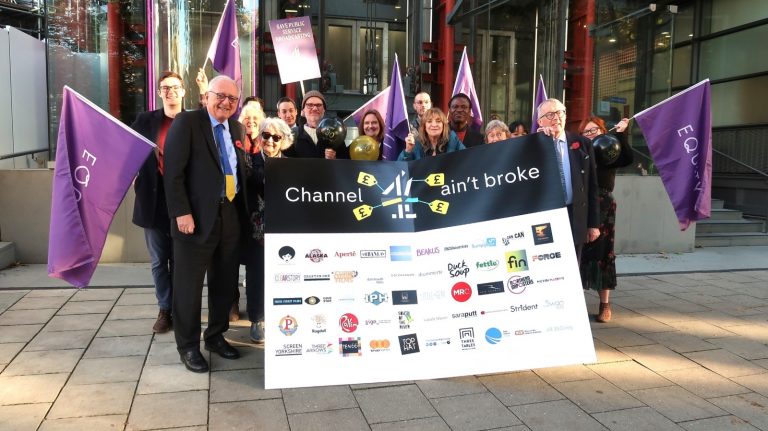 Campaigners handing in a birthday card to Channel 4