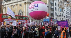 A photo of a demonstration with a Universities and Colleges Union balloon