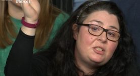 A still of an audience member on Question Time