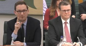 Darren Jones MP and Royal Mail boss Simon Thompson at a select committee hearing