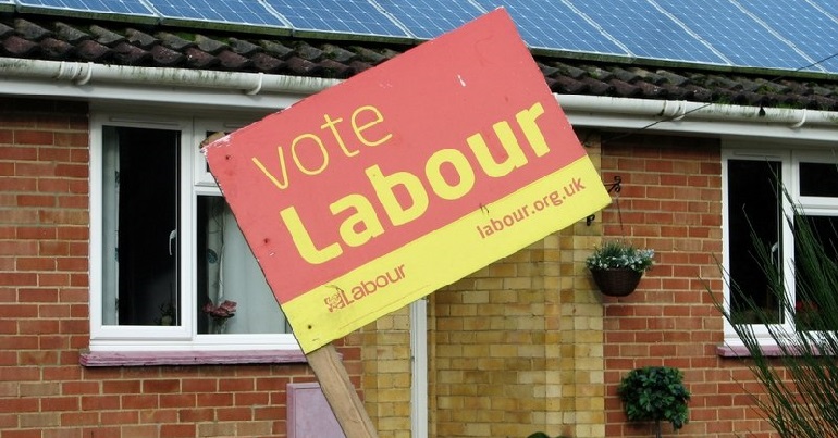 A placard reading "vote Labour"