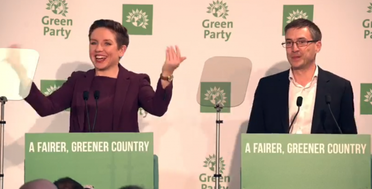 Carla Denyer and Adrian Ramsay speaking at Green Party conference