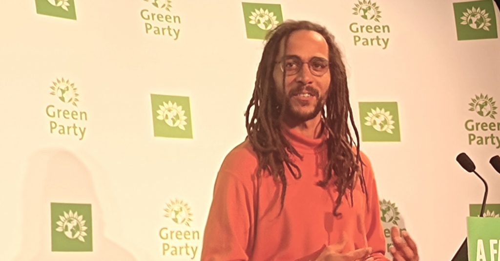 Tyrone Scott speaking at Green Party conference