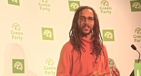 Tyrone Scott speaking at Green Party conference