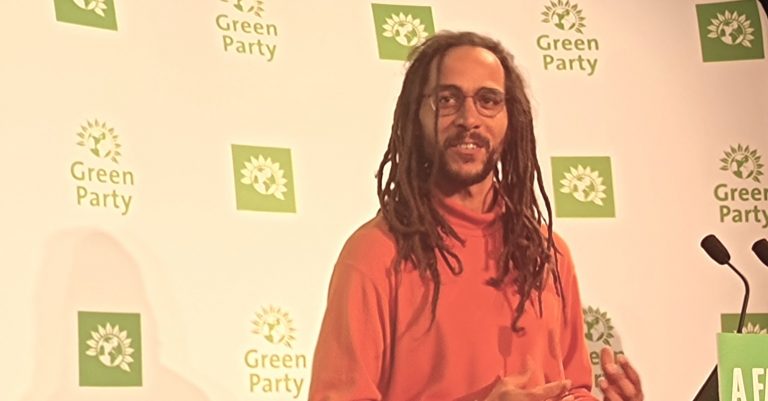 Tyrone Scott speaking at Green Party conference