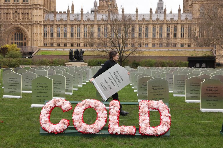 Greenpeace fuel poverty activists cemetery protest House of Parliament
