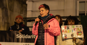 Zoe Garbett speaking at a rally
