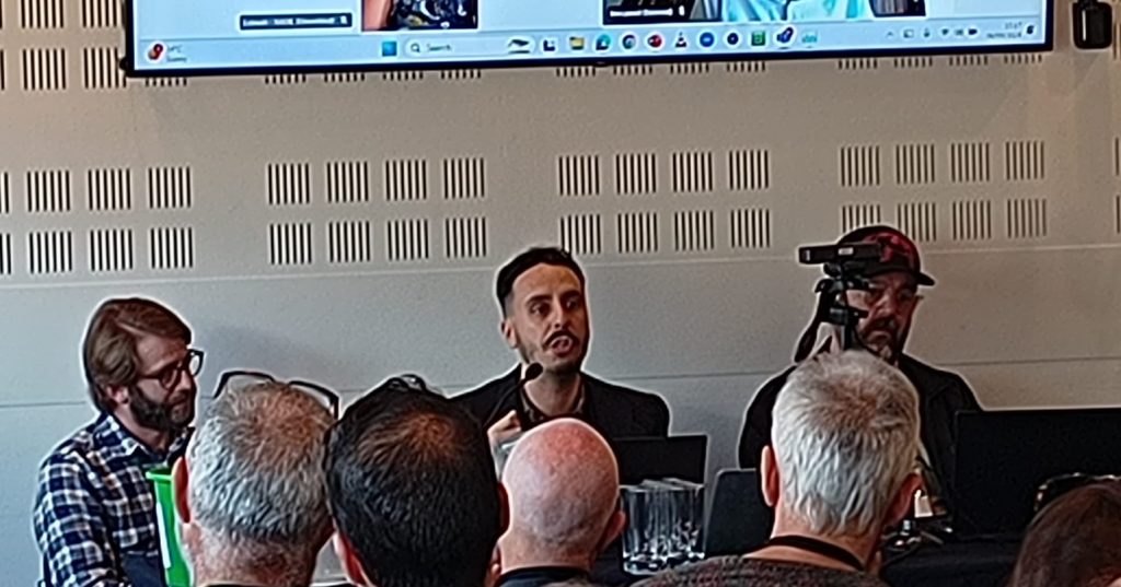 Green Party migration spokesperson Benali Hamdache speaking at a Palestine Solidarity Campaign fringe at Green Party Conference