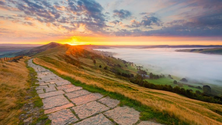 A photo of a hill in the Peak District at sunset
