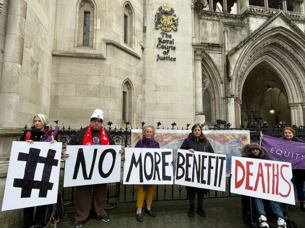A photo of campaigners outside the Royal Court of Justice