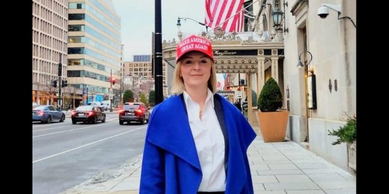 A photo of Liz Truss in a Make America great again cap while visiting Washington for Trump's inauguration in January