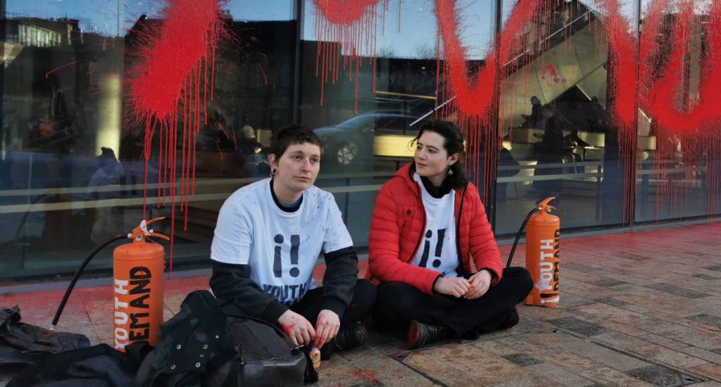 A photo of Hannah Taylor, 24, and Catriona Roberts, 22, who spray painted Glasgow university's James McCune Smith Learning Hub in protest over the university's investment in Israeli arms firms