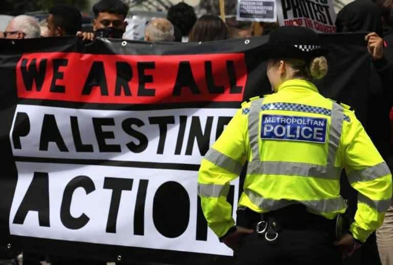 A demonstration with a banner reading "We are all Palestine Action"
