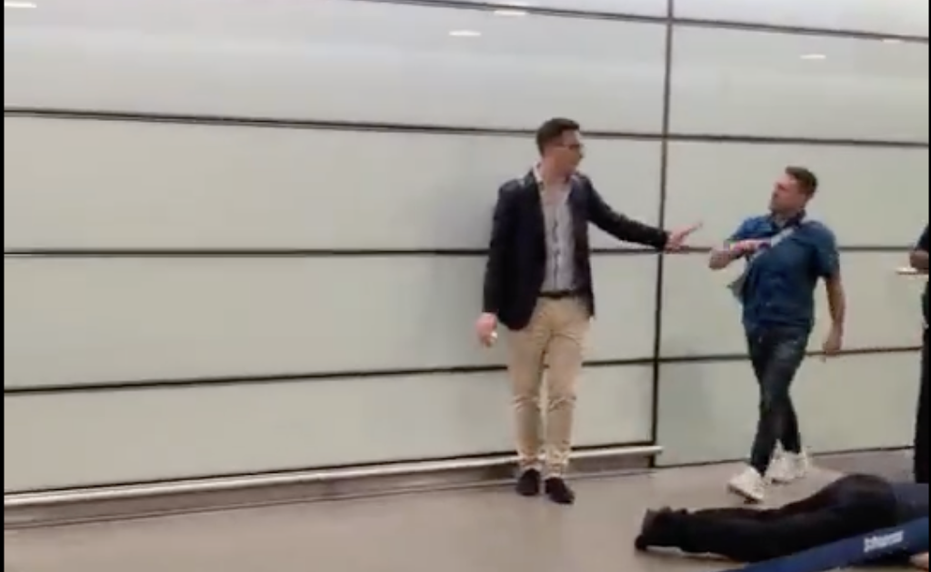 Tommy Robinson arrested at Luton airport over alleged St Pancras assault