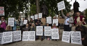 People protesting the banning of Palestine Action in Parliament Square
