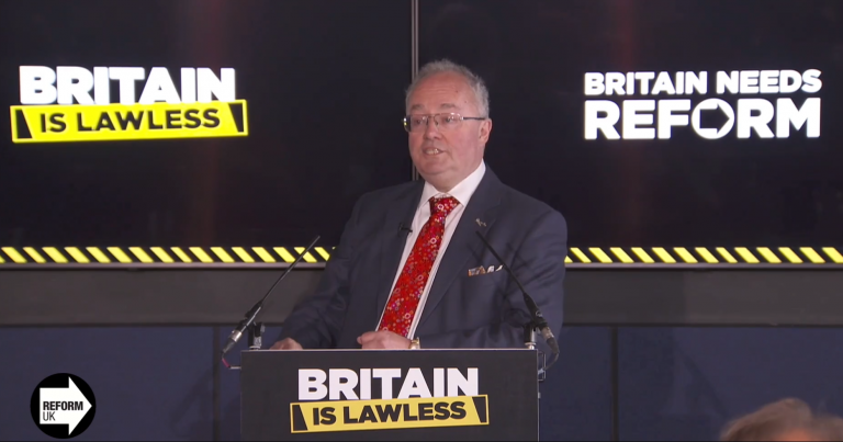 Rupert Matthews speaking at a Reform UK press conference