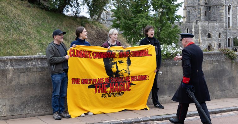 A photo of Fossil Free London activists protesting at Windsor Castle