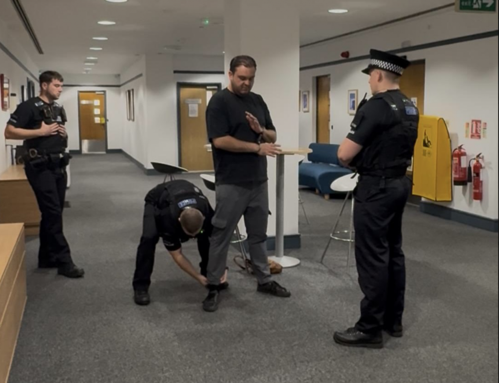 Reform councillor Sam Journet being arrested at Basildon council offices last month