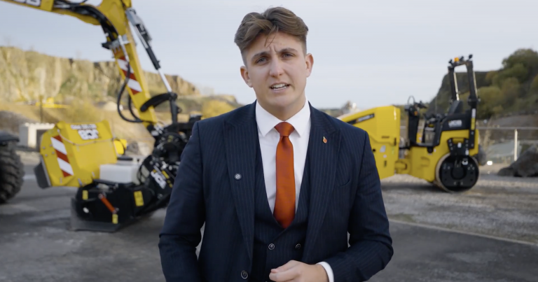 Councillor George Finch in a video about his visit to JCB's headquarters