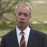 A photo of Nigel Farage making a speech about Henry Nowak's murder