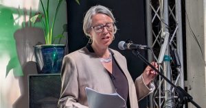 A photo of Geraldine Coggins, the Greens' Manchester mayoral candidate speaking at her manifesto launch