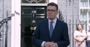 A photo of Andy Burnham at No 10, making his first speech as PM