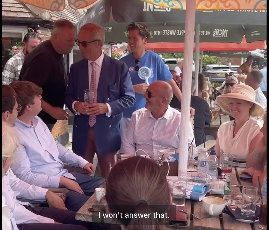 A photo of Nigel Farage with Reform campaigners in Clacton