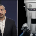 A photo of Count Binface speaking with journalist Mehdi Hasan