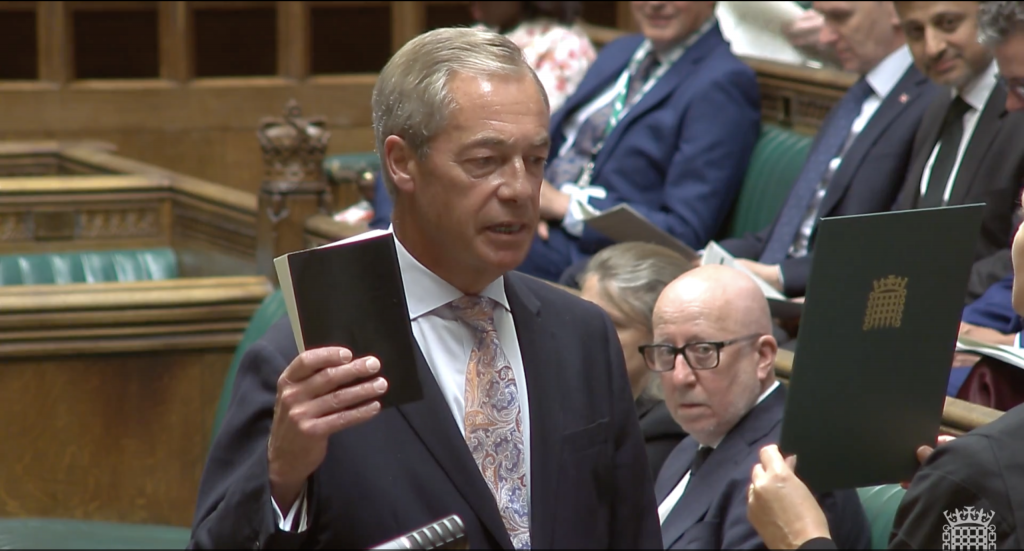 A photo of Nigel Farage being re-sworn in as an MP