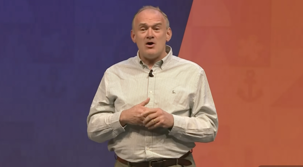 A photo of Ed Davey speaking at Lib Dem autumn conference