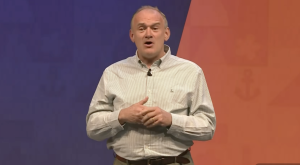 A photo of Ed Davey speaking at Lib Dem autumn conference