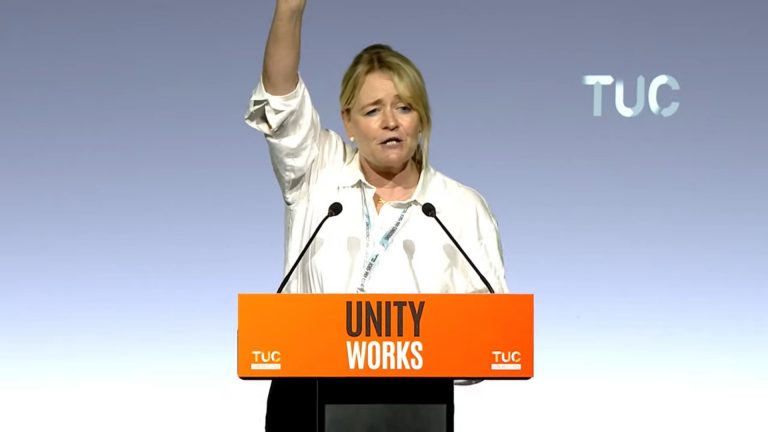 Angela Rayner raising her fist while speaking at TUC Congress