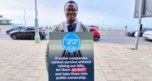 A photo of We Own It campaigner Johnbosco Nwogbo at Green Party conference