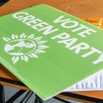 A vote Green placard Party