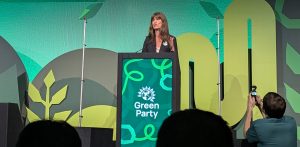 A photo of Rachel Millward making her speech at Green Party conference