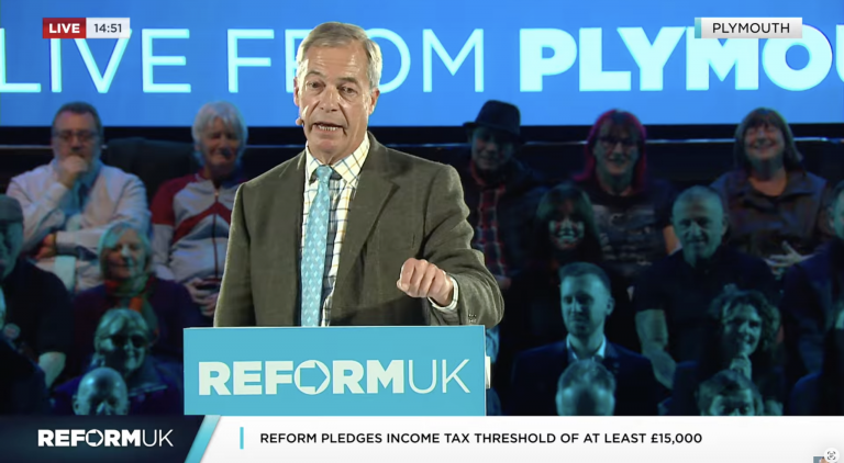 A photo of Nigel Farage making a speech